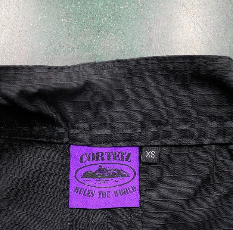 Corteiz Guerillaz Cargo Pants Black/Purple 